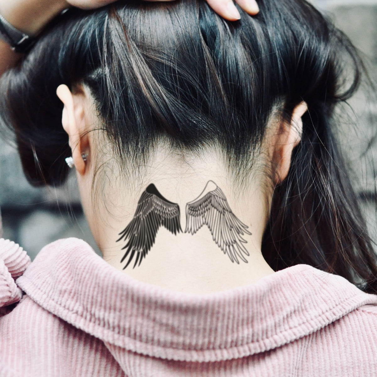 good and evil wings tattoo