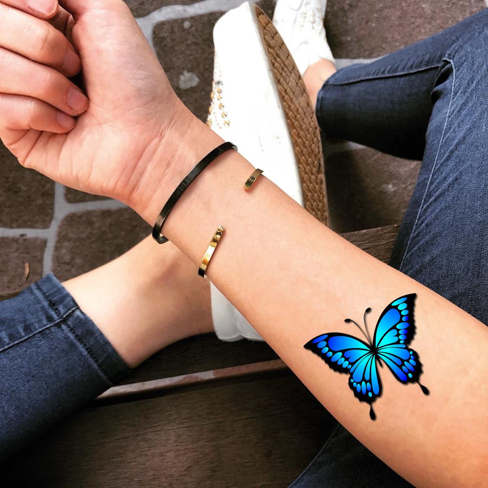 blue monarch butterfly tattoos