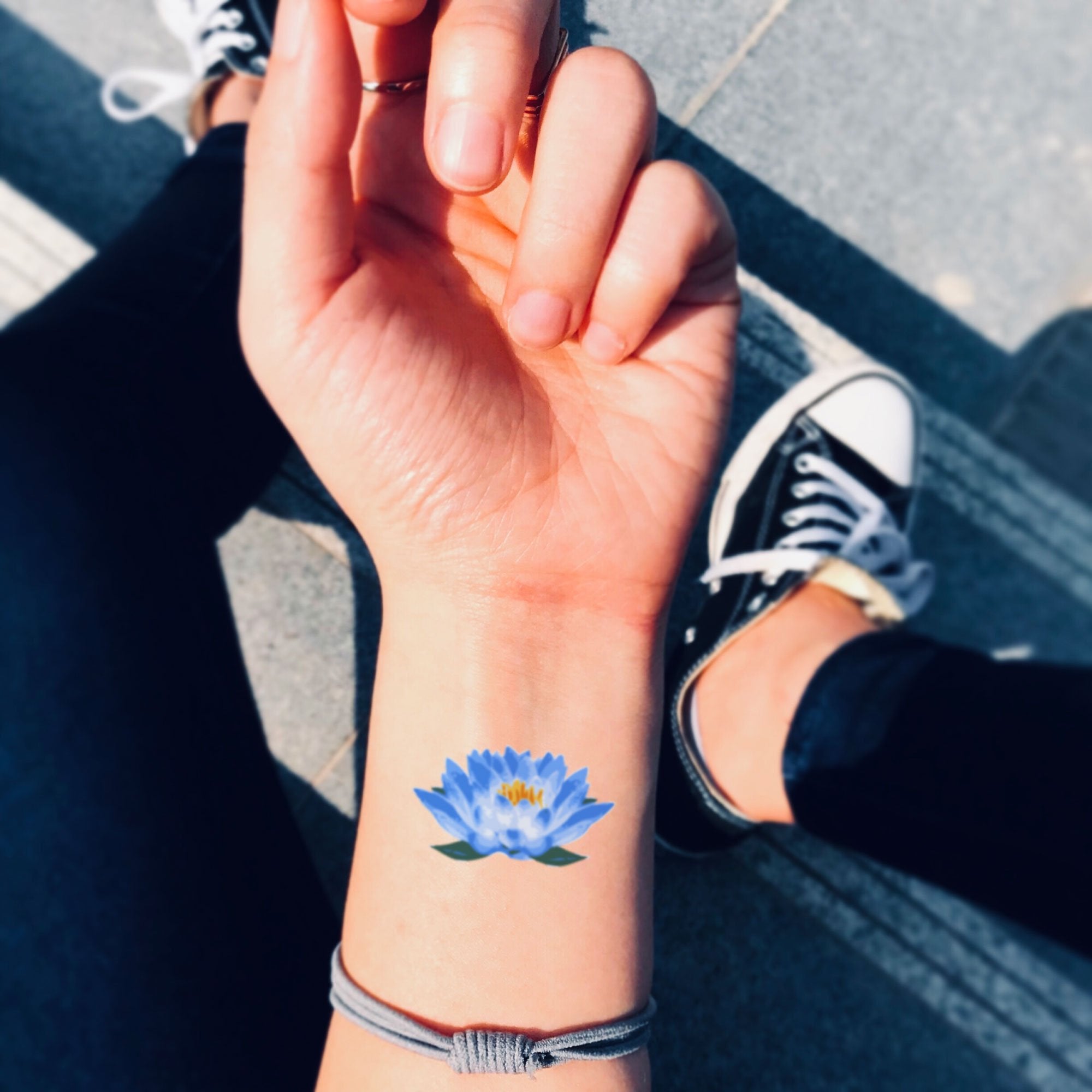 blue lotus flower tattoo wrist