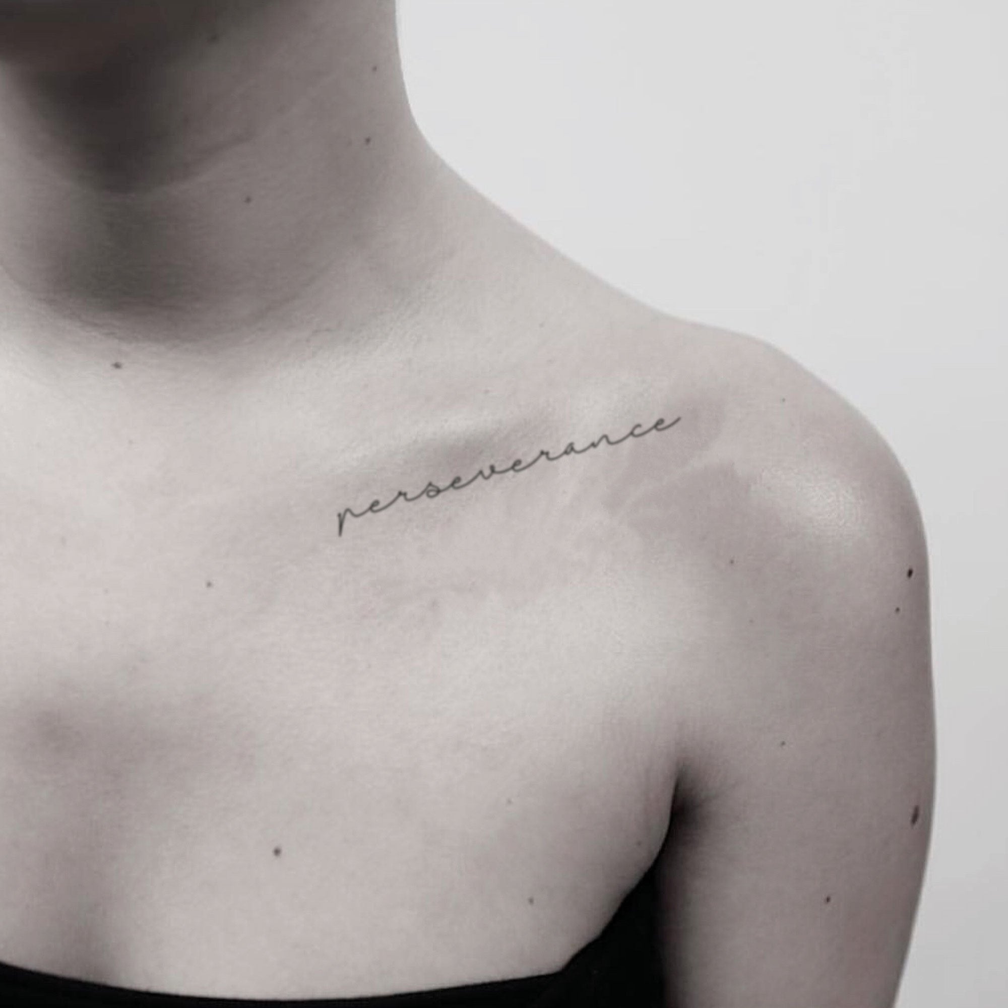perseverance tattoo on shoulder