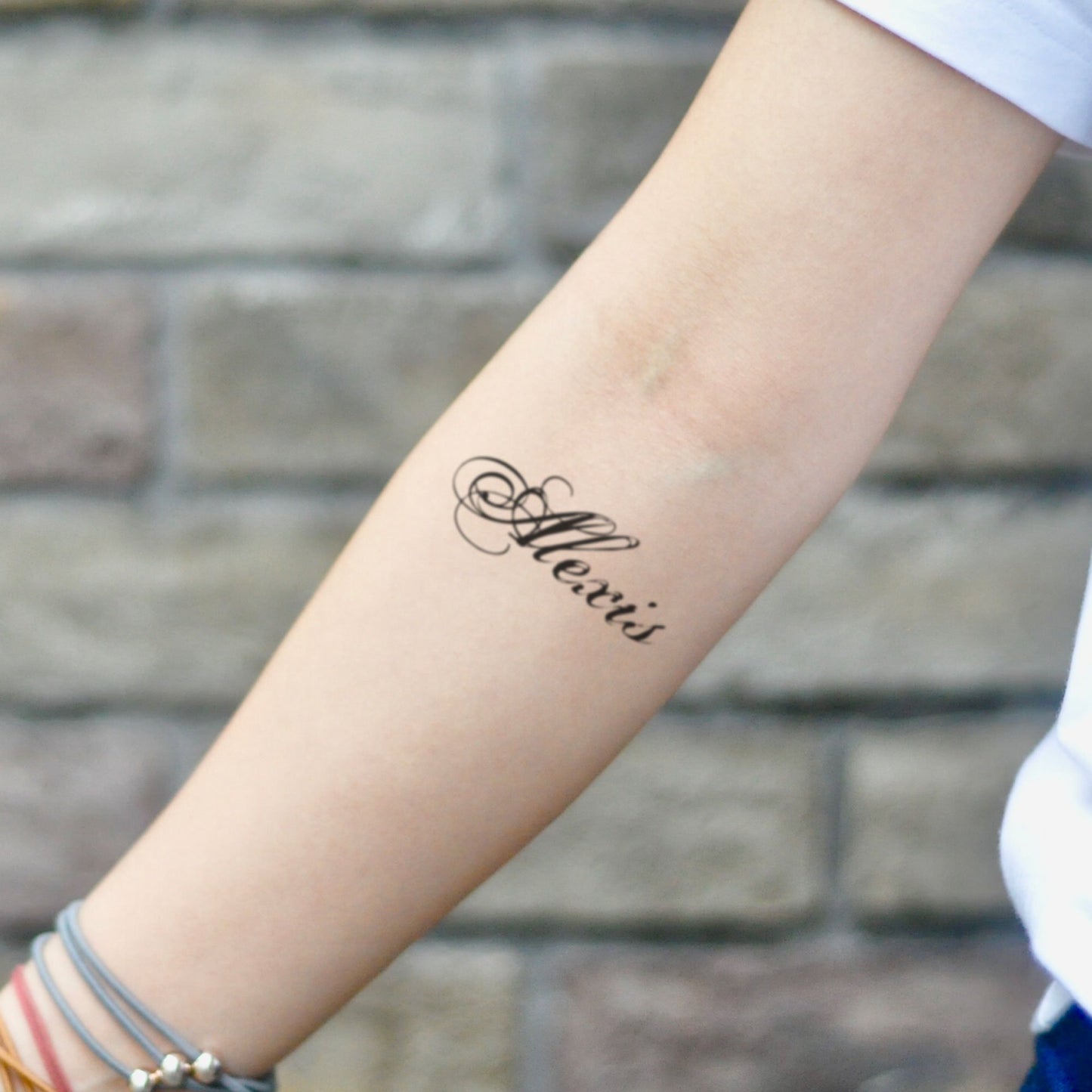 fake small alexis lettering temporary tattoo sticker design idea on inner arm