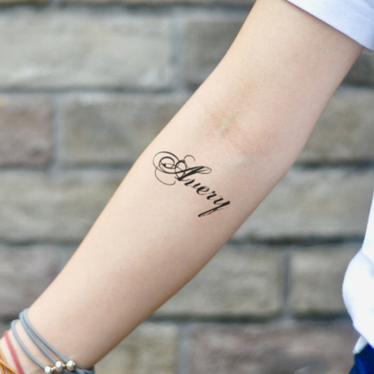 fake small avery name lettering temporary tattoo sticker design idea on inner arm