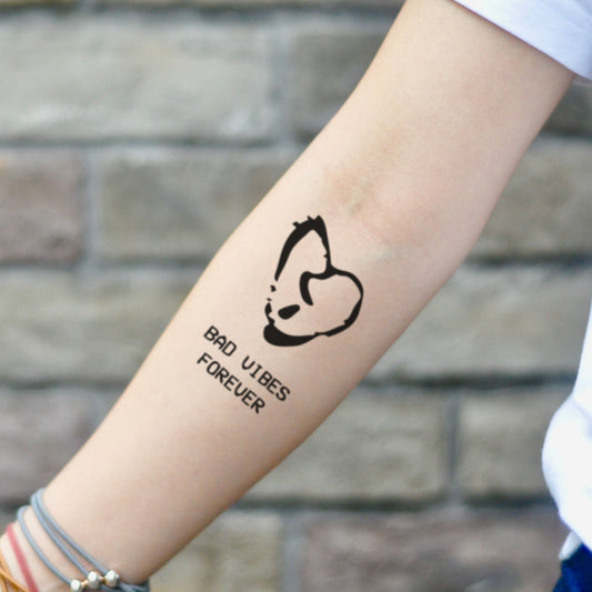 fake small bad vibes forever illustrative temporary tattoo sticker design idea on inner arm