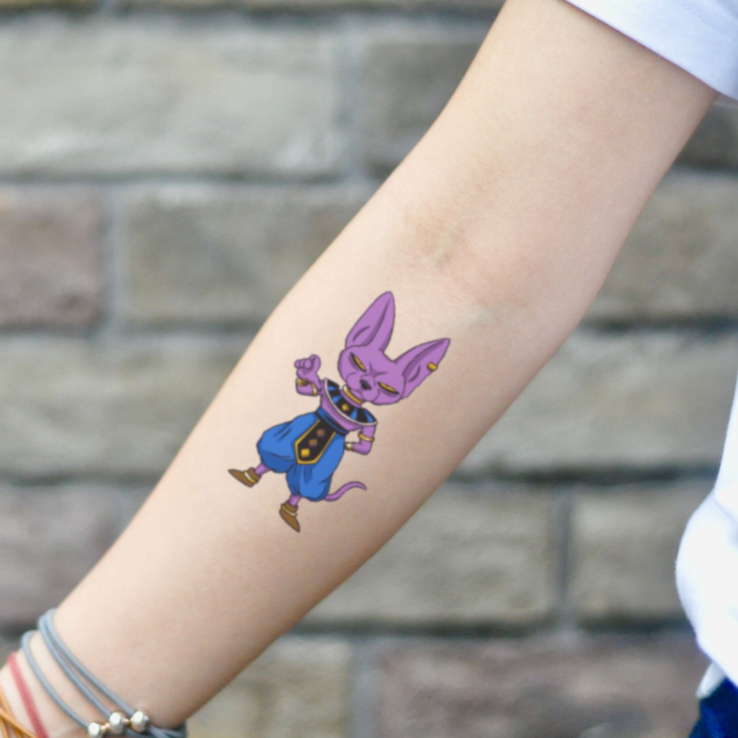 fake small beerus cartoon temporary tattoo sticker design idea on inner arm