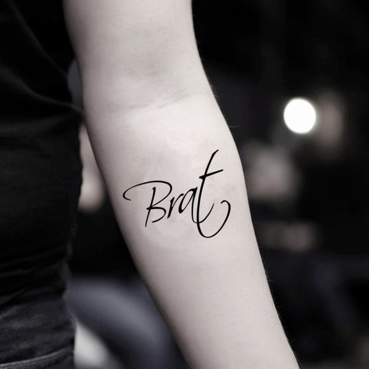 fake small brat lettering temporary tattoo sticker design idea on inner arm