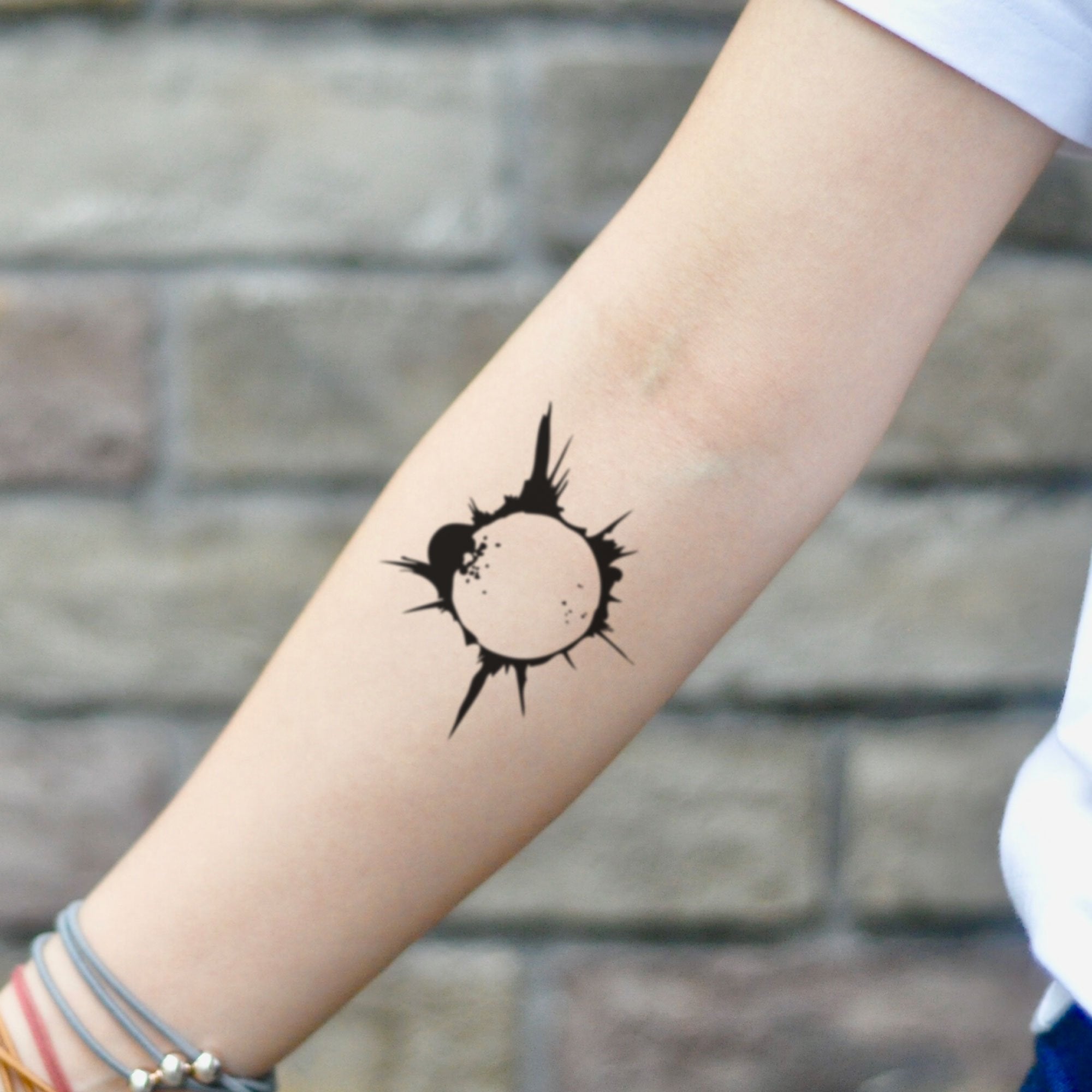 a small black tattoo based on the universe on the arm, | Stable Diffusion