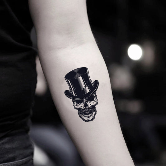 fake small top hat mad hatter illustrative temporary tattoo sticker design idea on inner arm